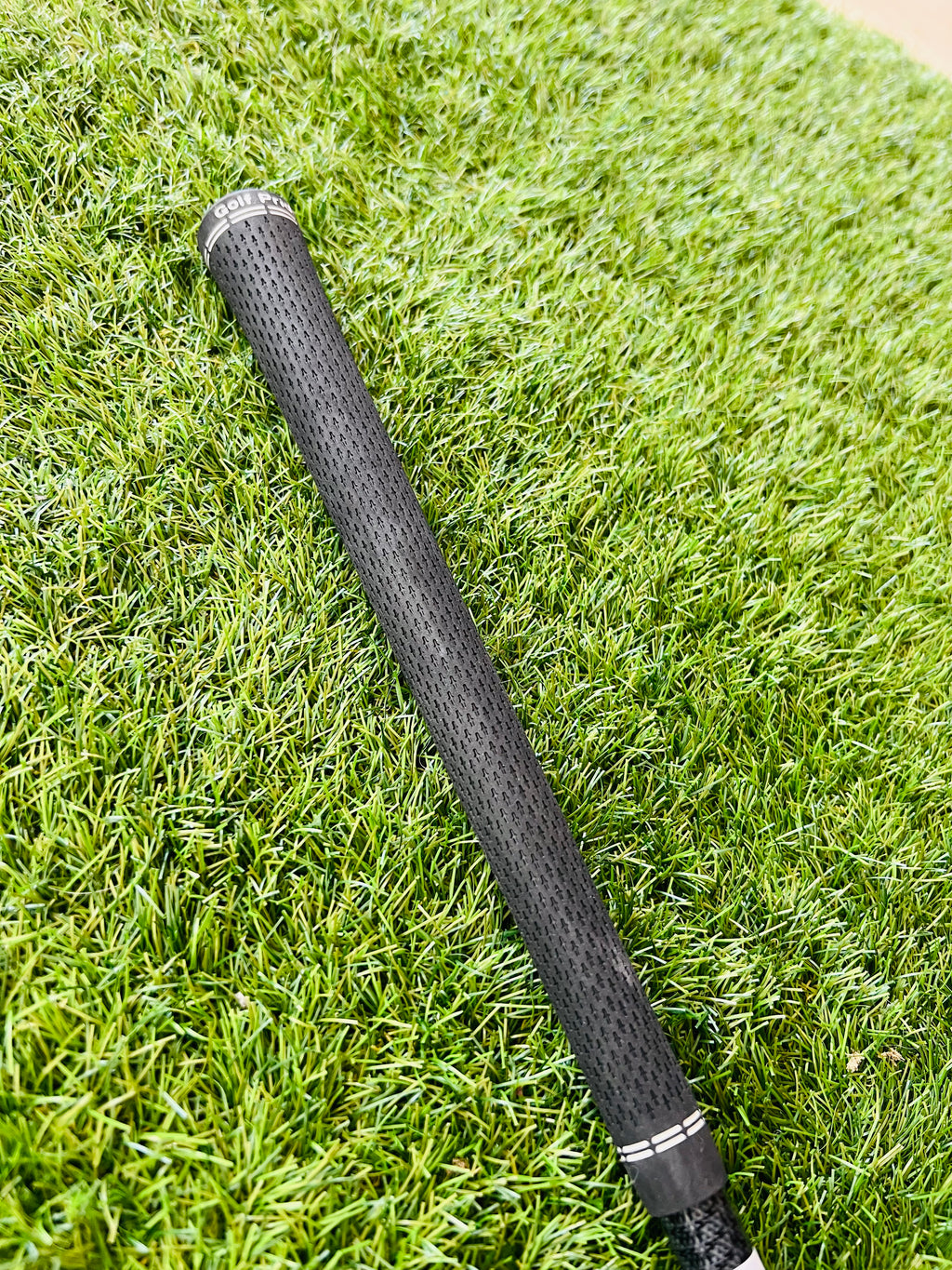 Titelist 915H hybride 2 (18°) rechtshandig golfclub, close-up van clubhoofd met grip en clubblad zichtbaar