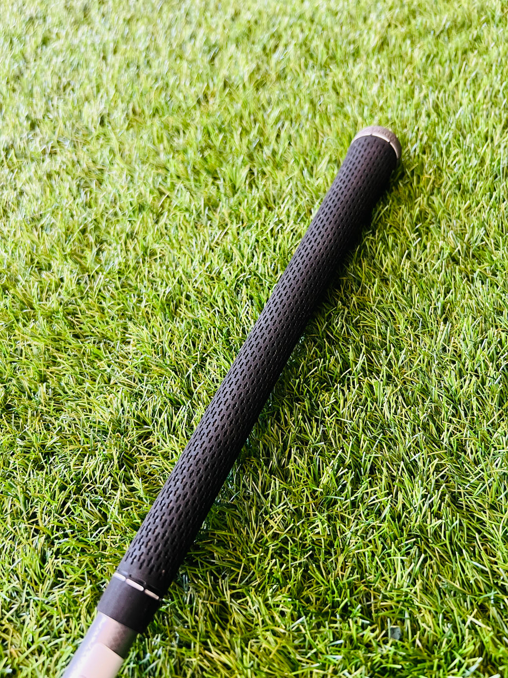 Titleist 915H hybride 2, 17,5°, rechtshandig, golfclub met graphite shaft en zwarte grip, gebruikt door golfer.