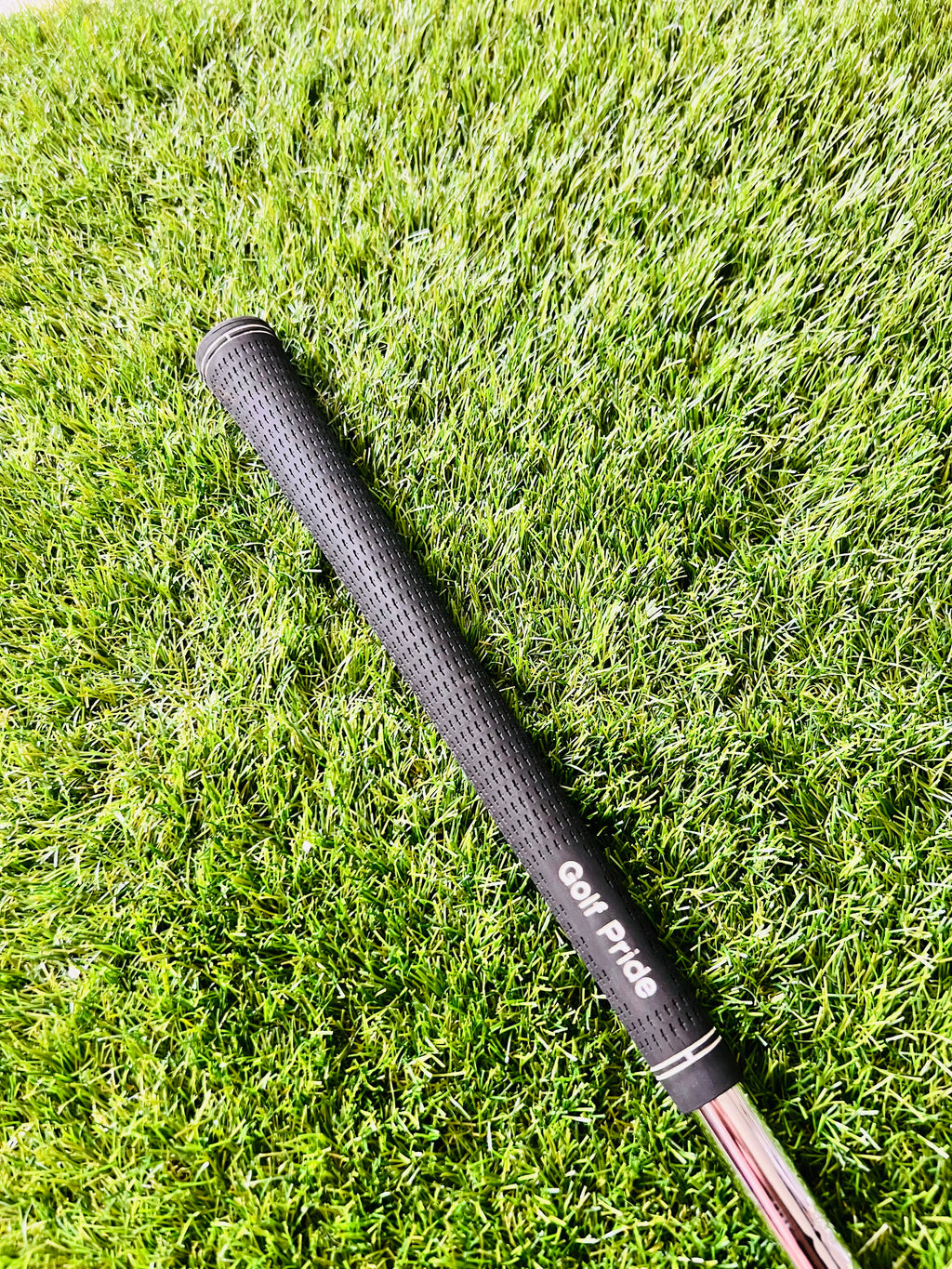 Golfpride grip op de Callaway Utility ijzer