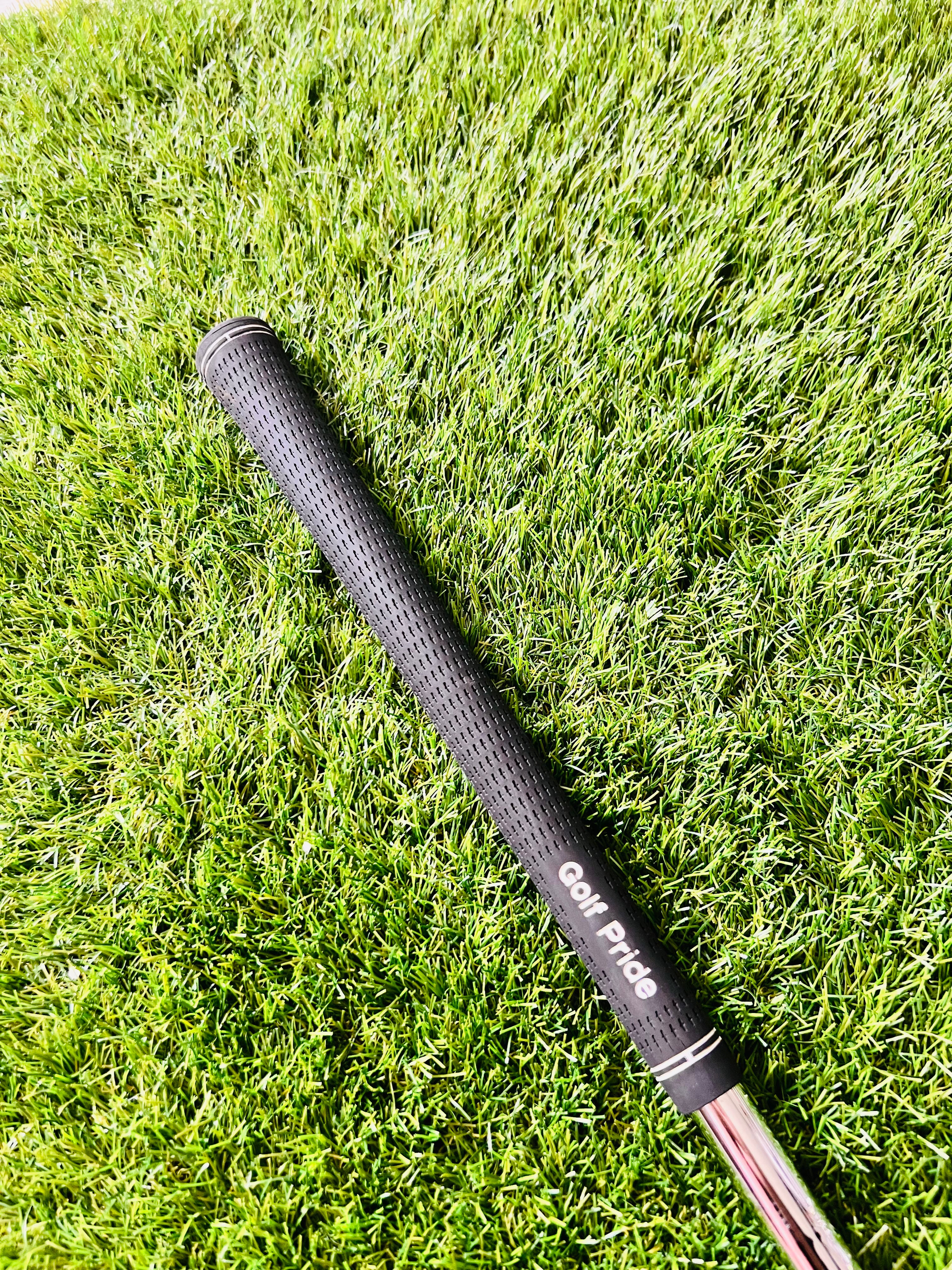Golfpride grip op de Callaway Utility ijzer